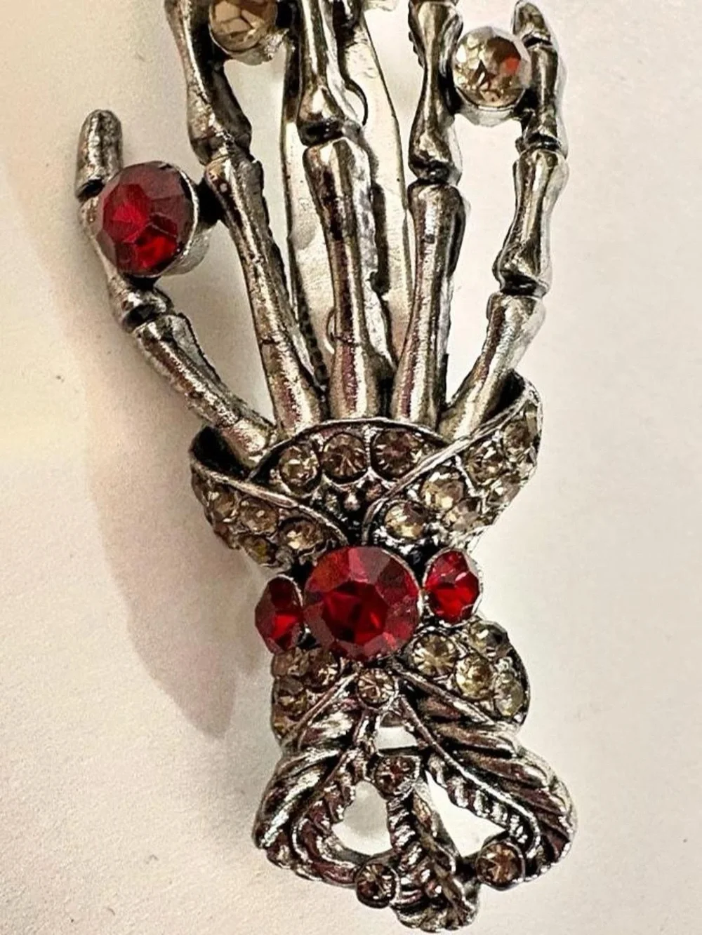 Silver tone Skeleton Hand Brooch with Red and Clear rhinestones